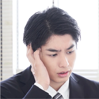 困っている男性